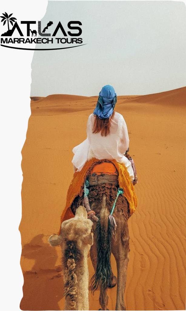 a woman riding a camel in the desert